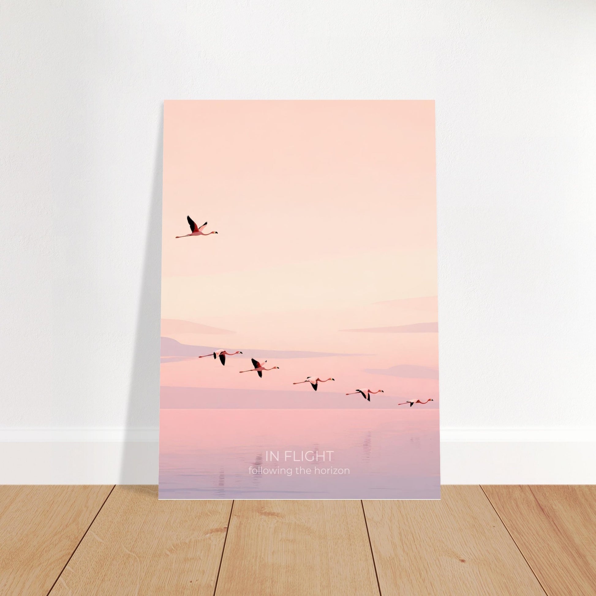 Flamingo wall art featuring a flock of pink birds flying over calm pastel waters, displayed in a bright modern interior.