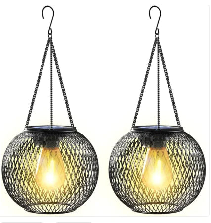 Two mesh hanging lights with glowing bulbs on a white background