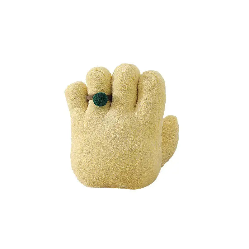 Beige paw-shaped toy with a green button on a white background