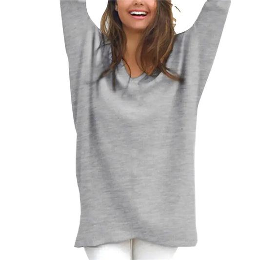 Gray sleeveless top worn by a person on a white background