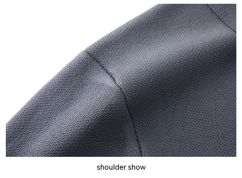 Close-up of a gray textured fabric with 'shoulder show' text