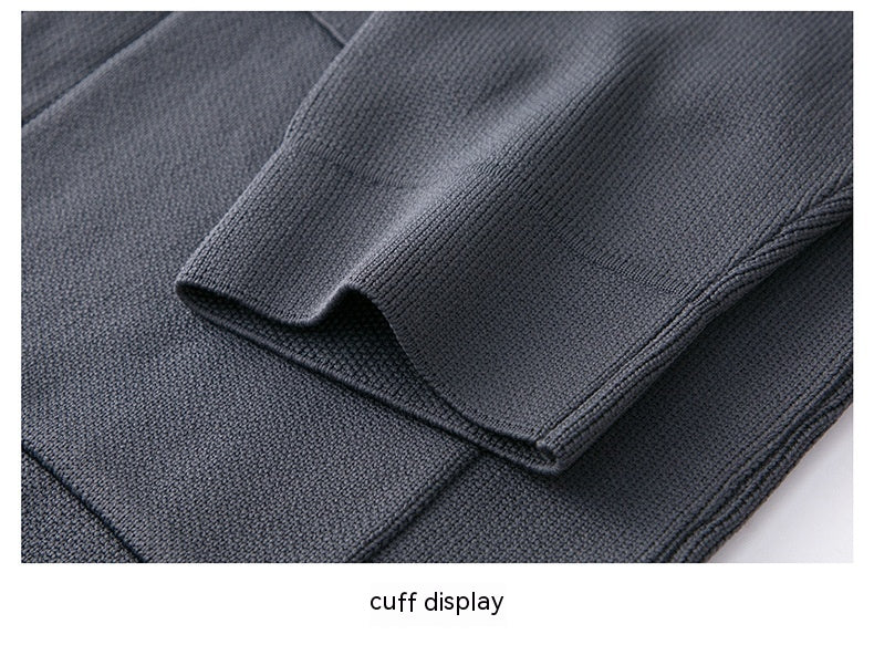 Close-up of a dark gray fabric with a cuff display on a white background