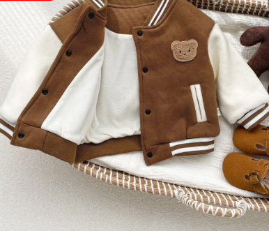 Brown varsity jacket with white accents on a white surface