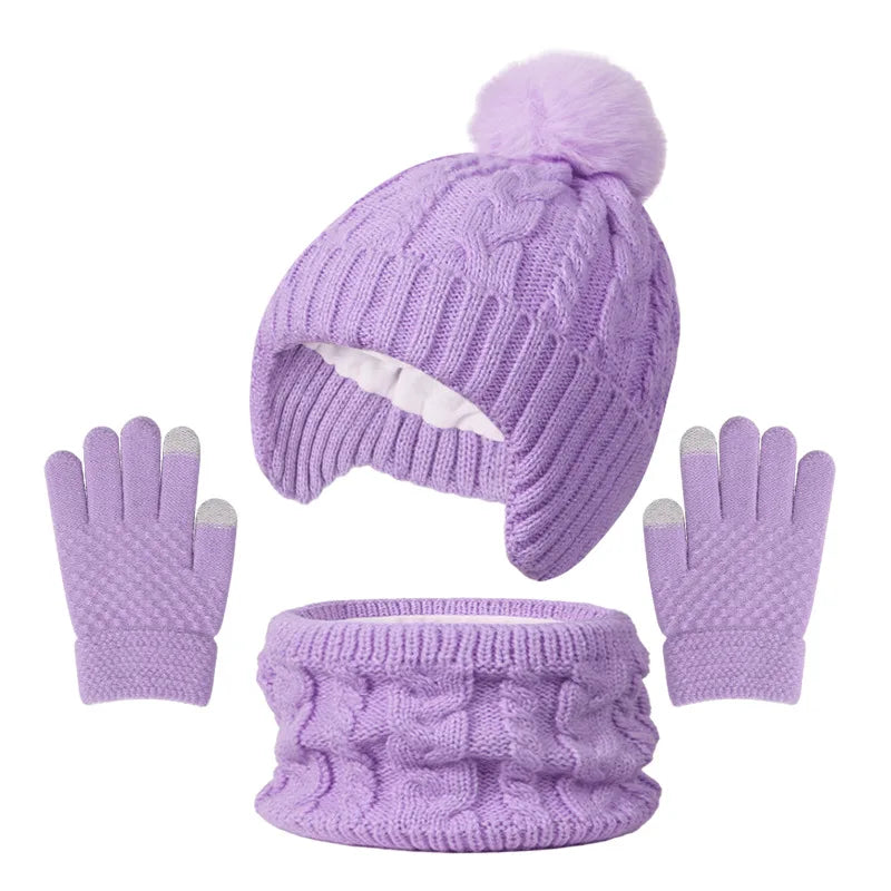 Purple knit set with hat, gloves, and scarf on a white background