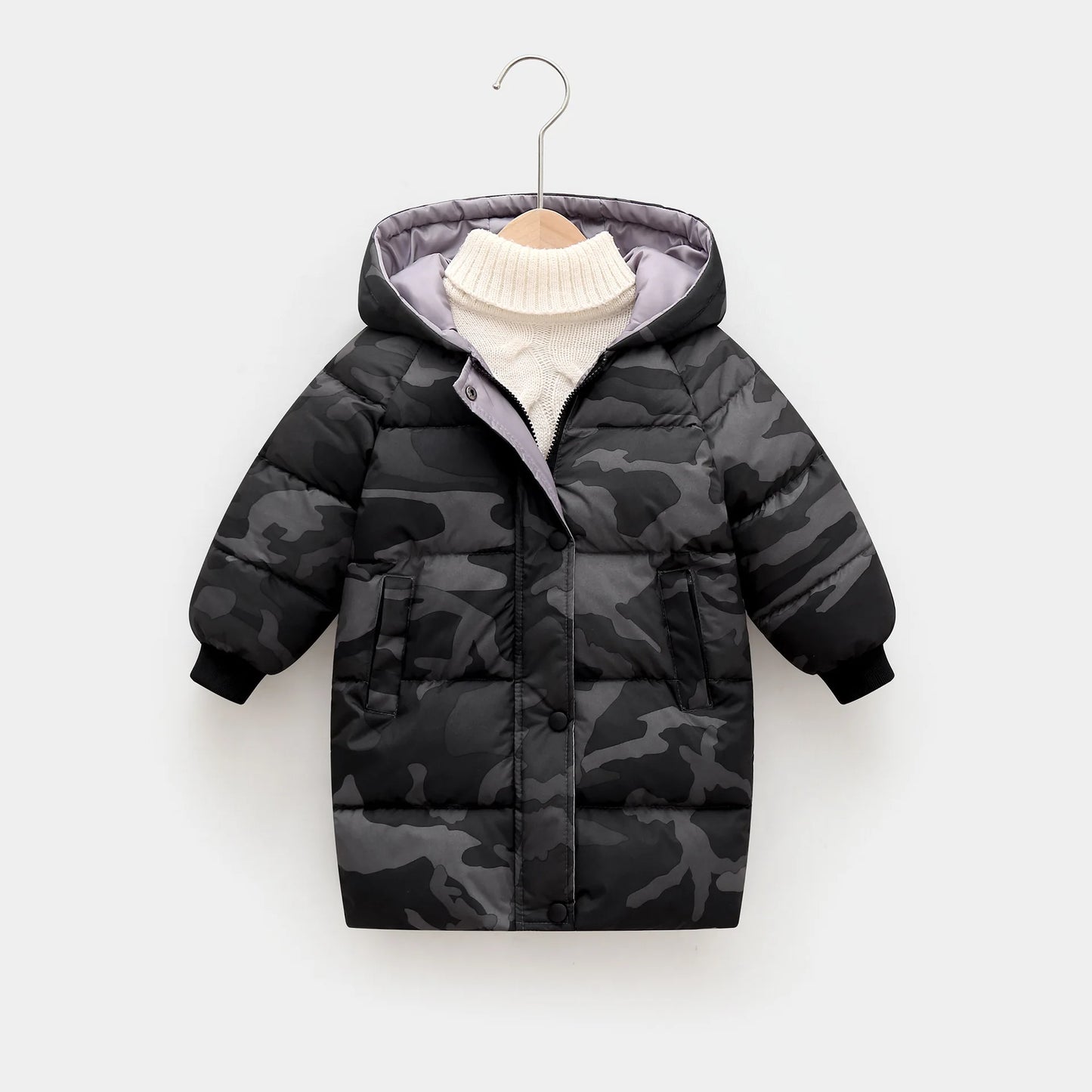 Camouflage-patterned children's puffer jacket on a white background