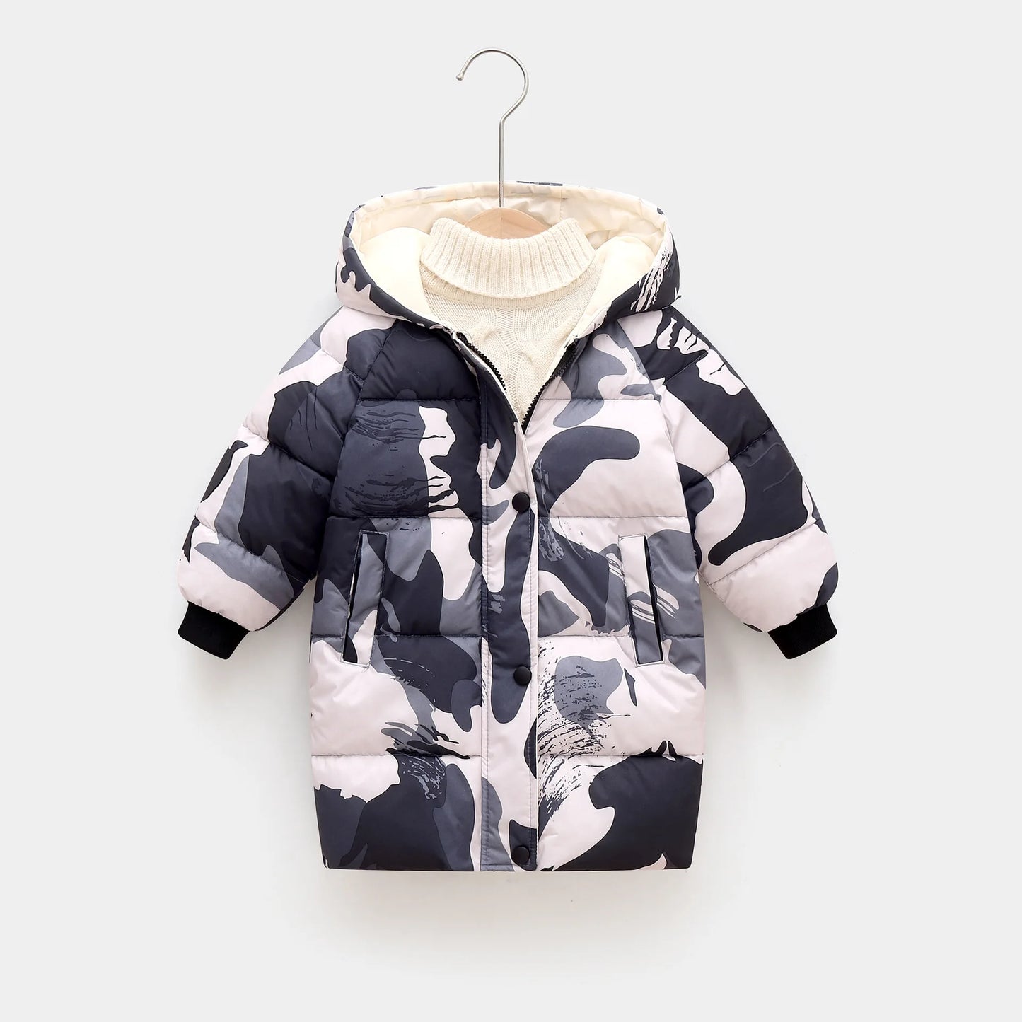 Camouflage-patterned children's puffer jacket on a white background