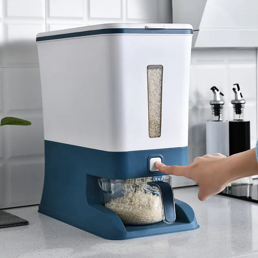 White and blue kitchen storage container with a hand pressing a button, set against a kitchen background.