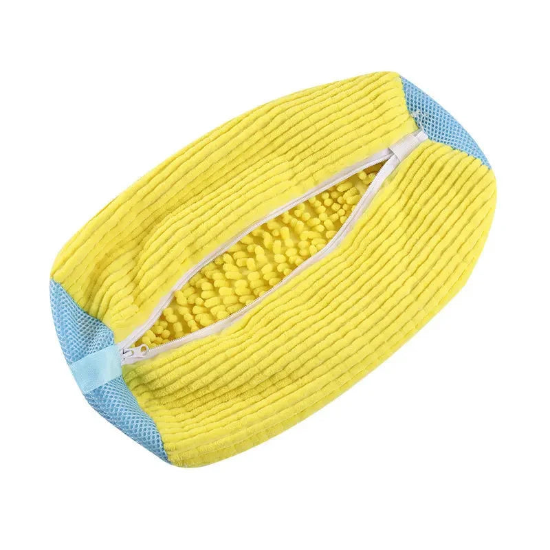 Yellow cleaning pad with blue edges on a white background