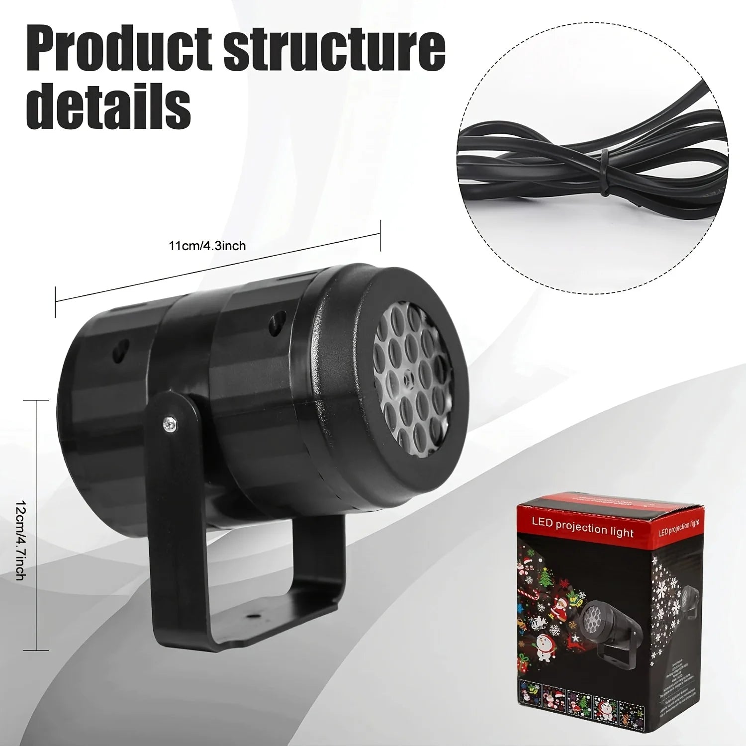 Black LED projection light with packaging and cable on a gray background