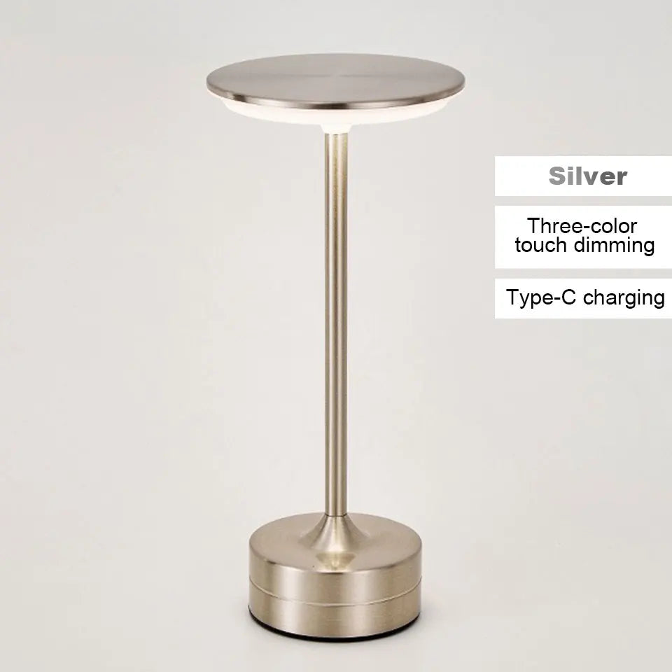 Silver LED side table with three-color touch dimming and Type-C charging on a light gray background
