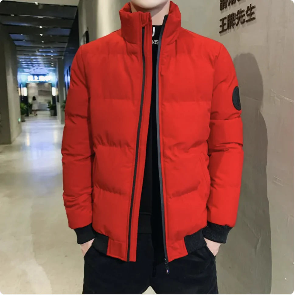 Red puffer jacket worn by a person in an indoor setting