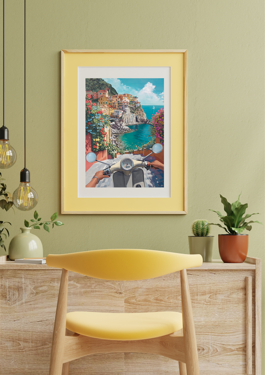 Framed artwork of a scenic coastal town with a yellow chair and desk in the foreground.