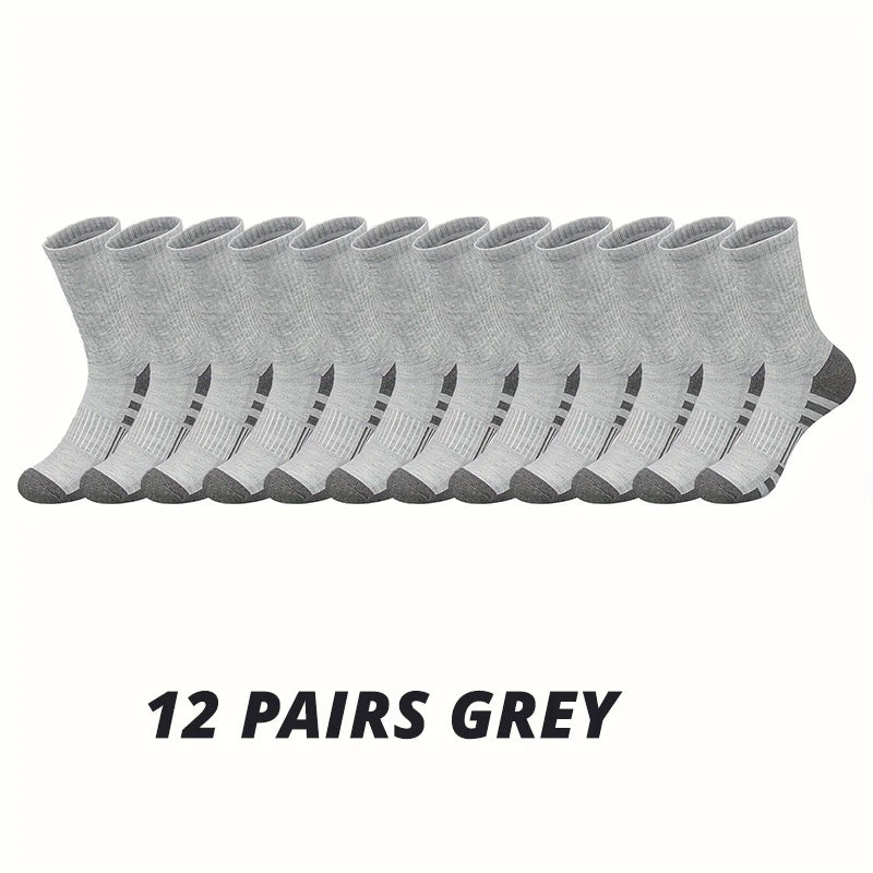 12 pairs of grey socks on a white background