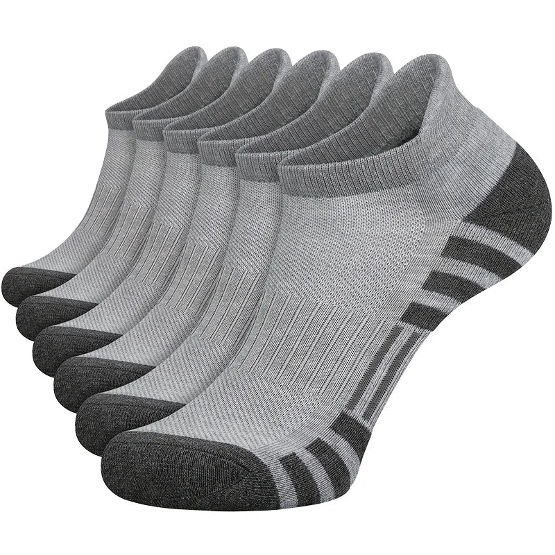 Set of six gray ankle socks with black accents on a white background