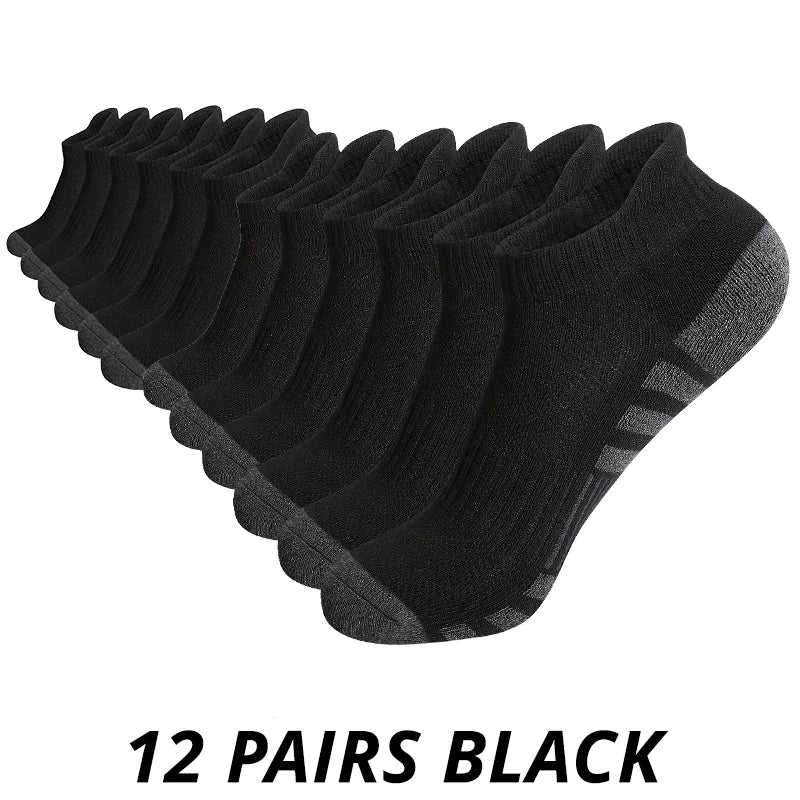 12 pairs of black socks on a white background
