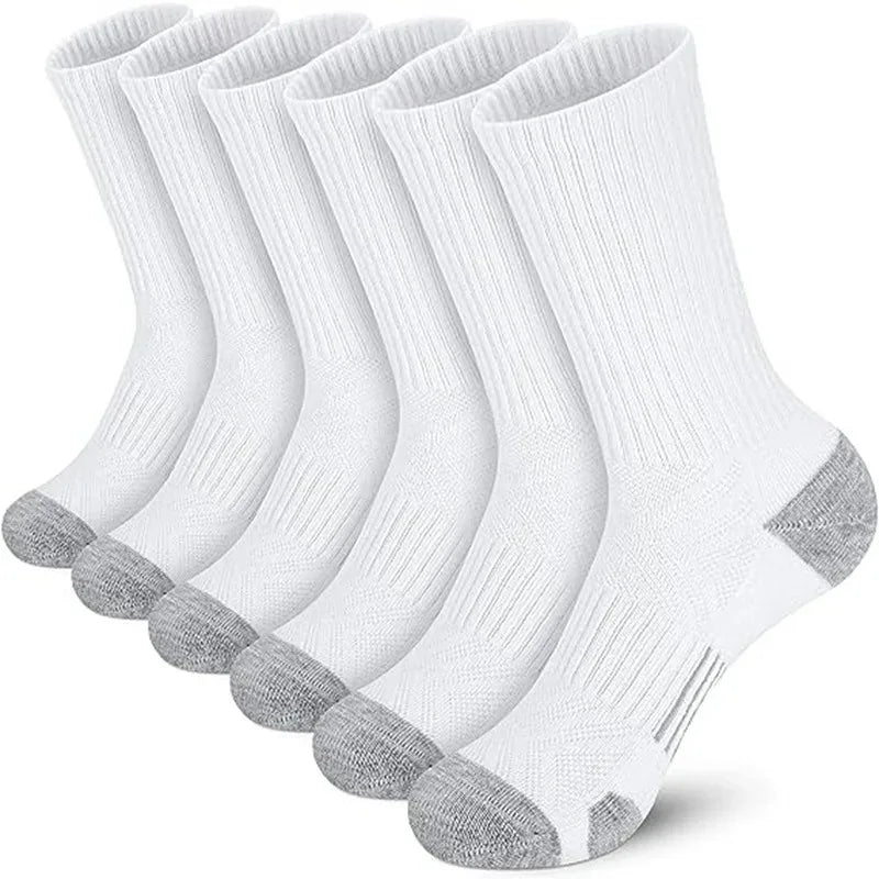 Set of five white socks with gray toes and heels on a white background