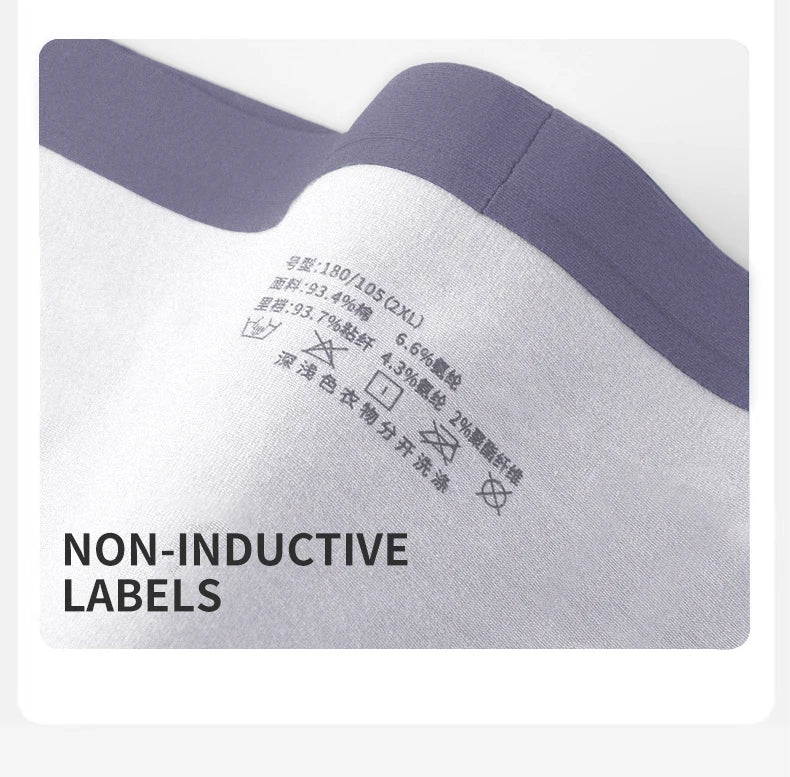 Text label on fabric with washing instructions and 'Non-Inductive Labels' text.