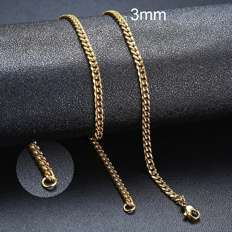 Two gold chains on a dark surface with '3mm' text.