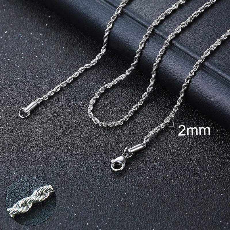 Silver chain necklace on a dark surface with '2mm' text
