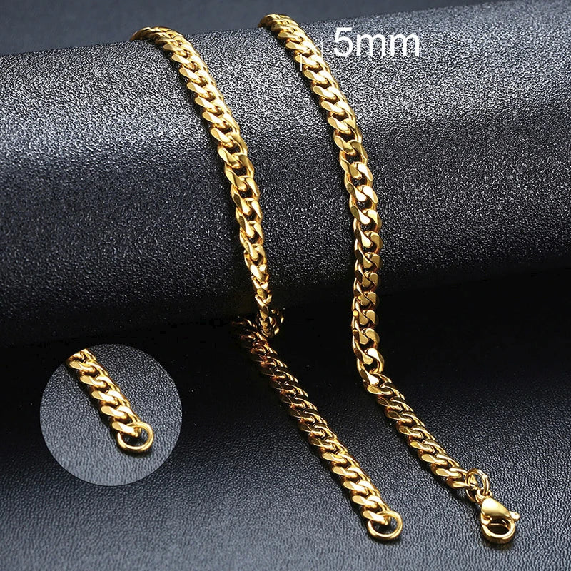 Gold chain bracelet on a dark surface with '5mm' text
