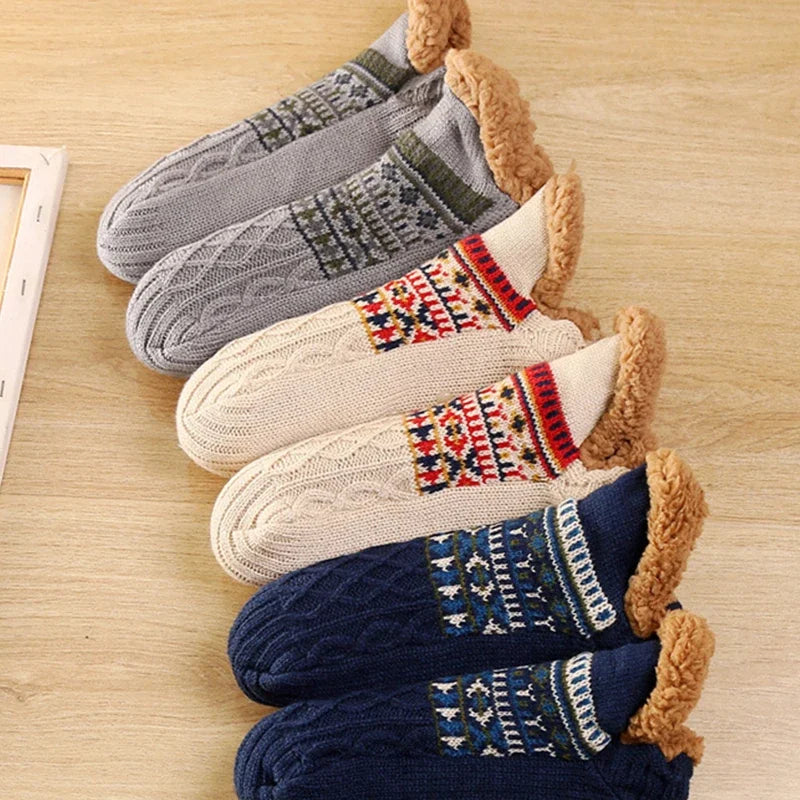 Men’s thermal fluffy slipper socks in grey on bedroom floor