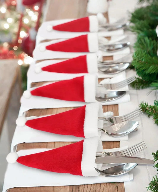 Mini Christmas Hat Cutlery Holders on festive table setting