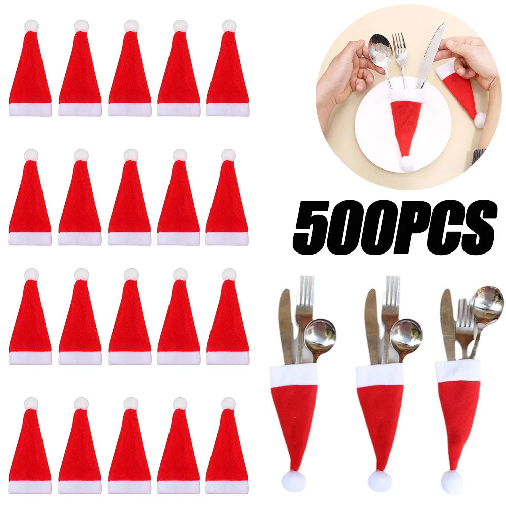 Red Santa hat cutlery holders with a close-up of their use on a plate, labeled '500PCS'.