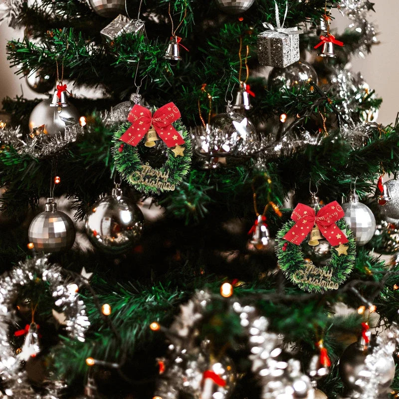 Decorated Christmas tree with wreath ornaments and lights