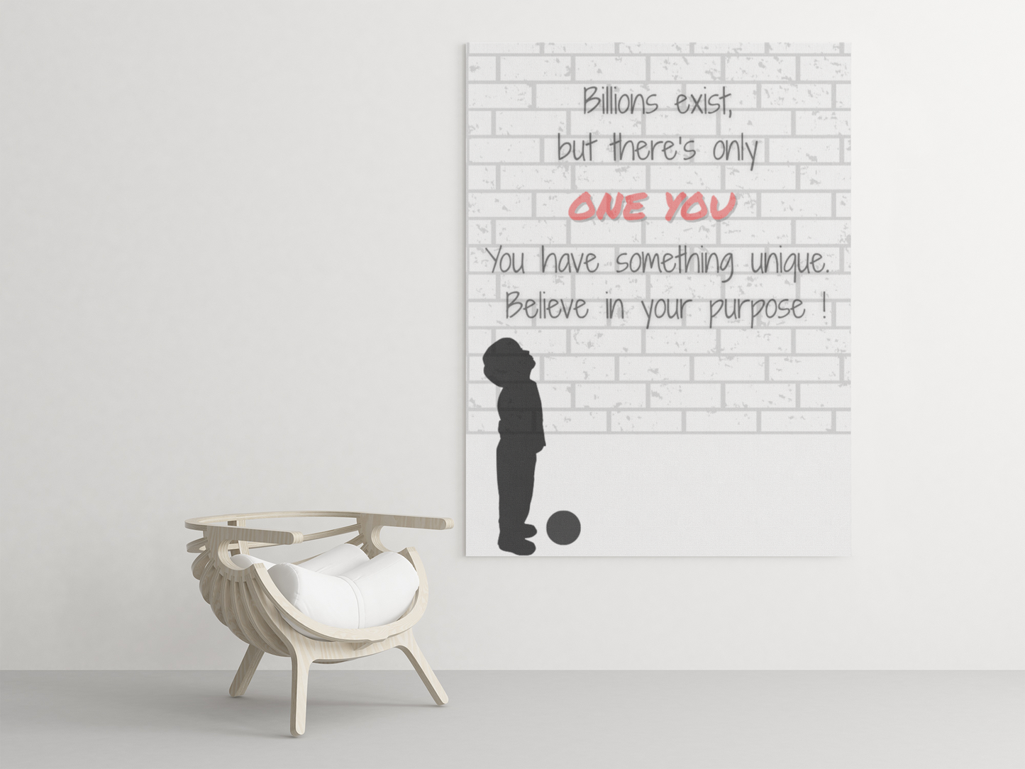 Motivational poster with silhouette of a child and text on a white wall, with a chair in the foreground.