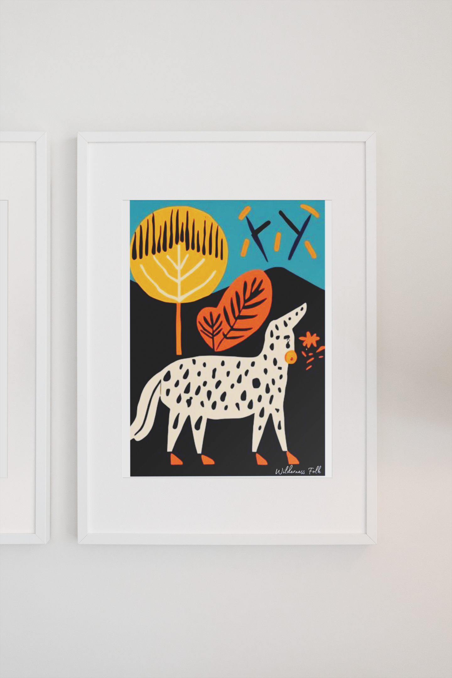 Framed artwork of a stylized animal with abstract leaves on a white wall