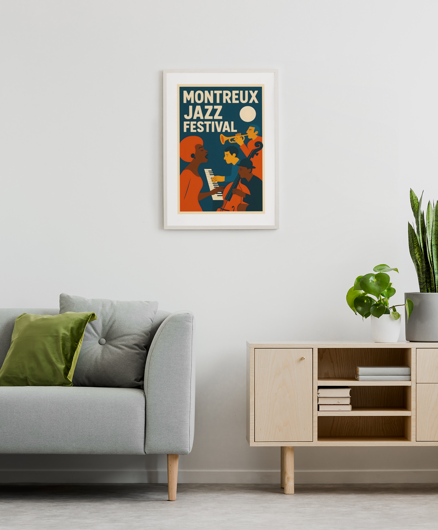 Montreux Jazz Festival poster on a wall above a grey sofa in a modern lounge with a plant and table below.