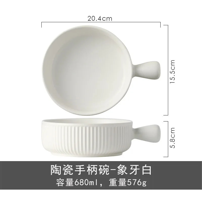 White ceramic bowl with handle and dimensions on a white background