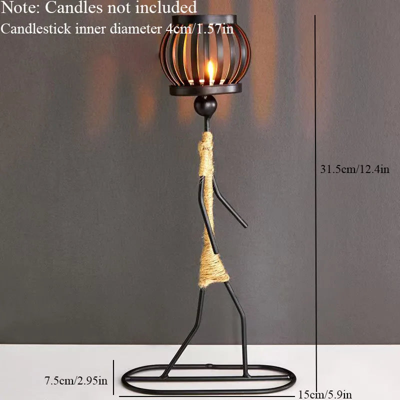 Decorative lamp with metal stand and candle holder on a dark background