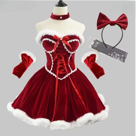Red velvet dress with white trim on a mannequin, accompanied by a headband and gloves on a gray background.
