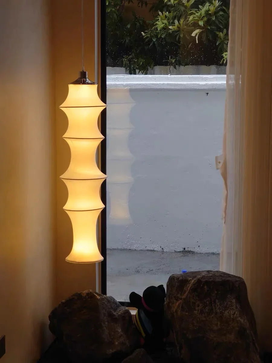 Lamp with a beach view through a window