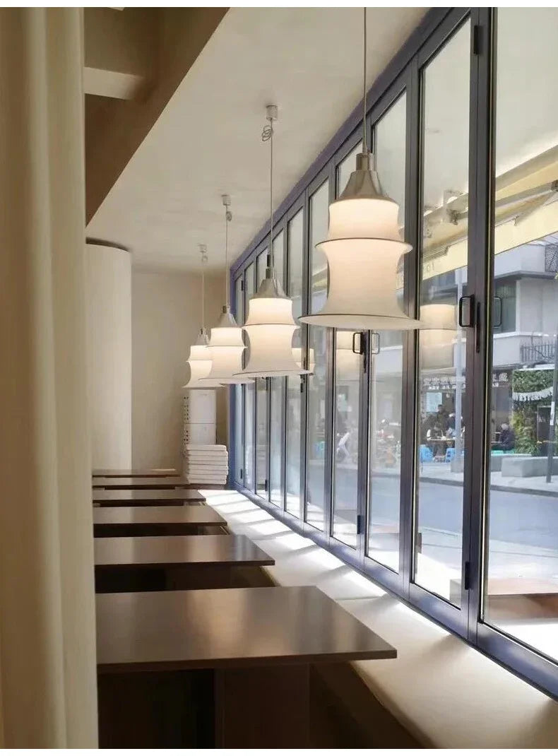 Modern interior with pendant lights and large windows