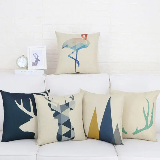 Set of six Nordic-style cushion covers with minimalist animal and nature designs, displayed on a white sofa in a cozy, modern living space.