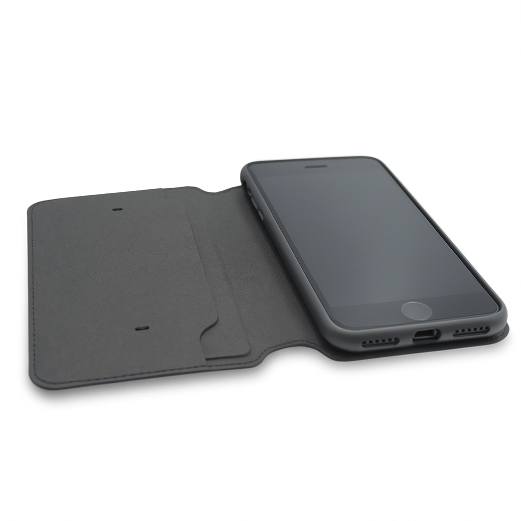 Close-up of an open black biodegradable flip phone case with visible card slots and smooth inner lining, holding a smartphone.