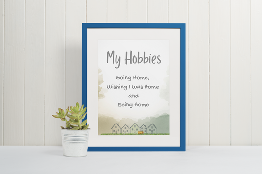 Cozy typography printable wall art featuring “My hobbies include going home, wishing I was home, and being home” with hand-drawn house illustrations