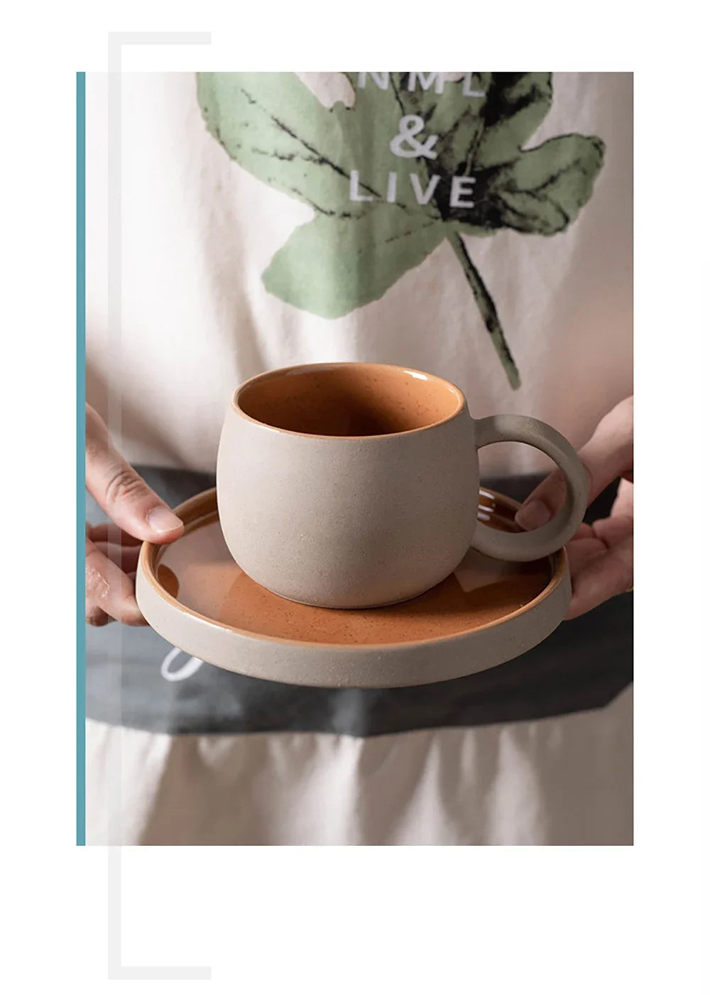 Ceramic cup and saucer held by hands with a leafy background