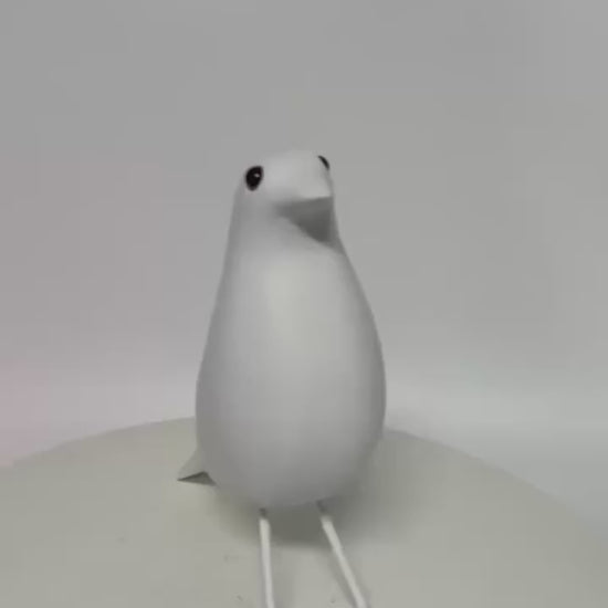 Video of a Matte resin bird sculpture in Nordic minimalist style displayed as a modern decorative ornament for living rooms, bedrooms and offices.