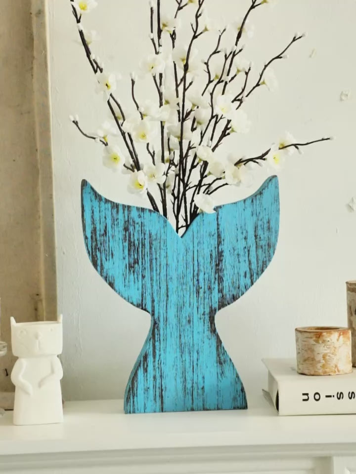 Video of a Blue whale tail rustic wooden vase