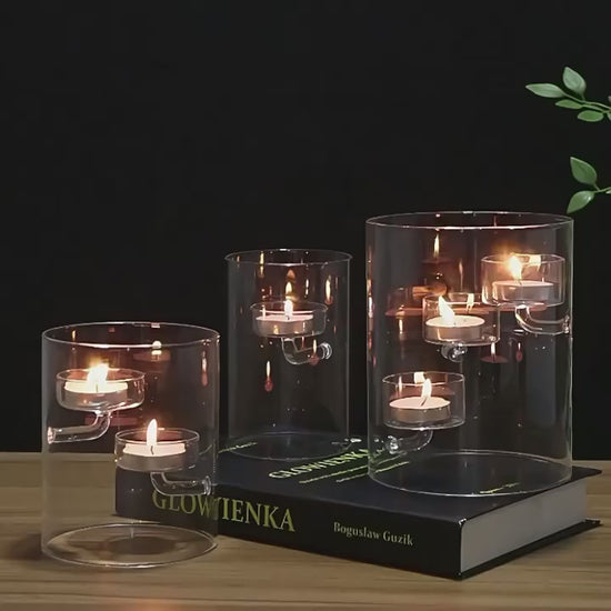Video of Modern cylindrical glass candle holders with suspended tealight platforms