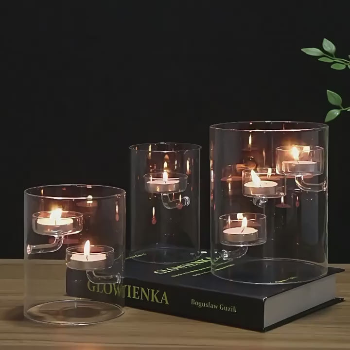 Video of Modern cylindrical glass candle holders with suspended tealight platforms