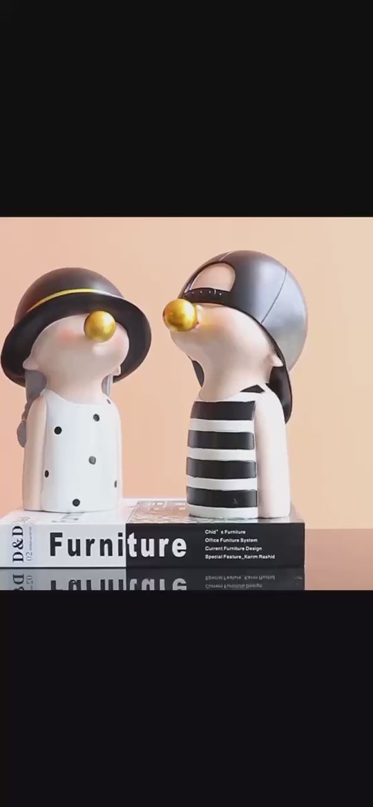 Video of Cute Nordic style figurines with bubble gum detail in soft pastel colours, displayed as modern desk and shelf decor