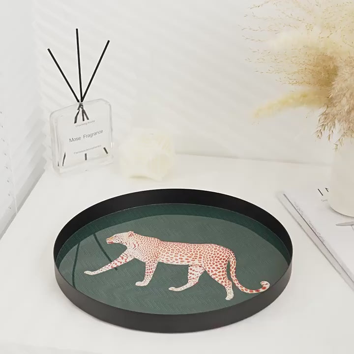 Video of a Green metal decorative tray with illustrated leopard design