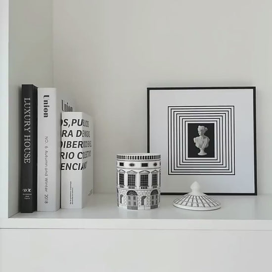 Video of Black and white architectural ceramic storage jars 