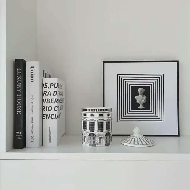Video of Black and white architectural ceramic storage jars 