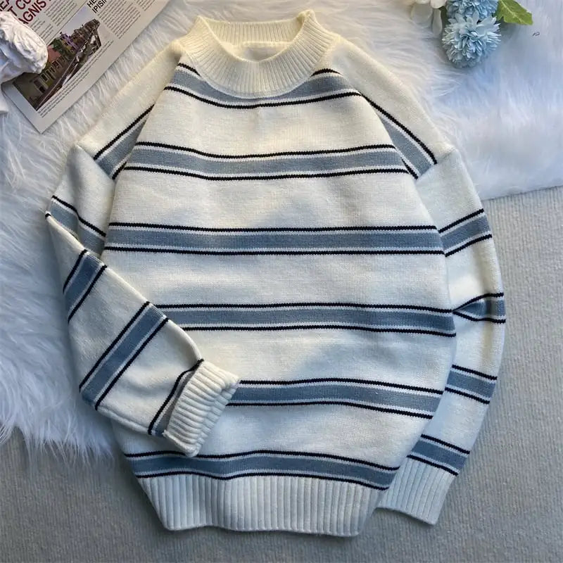 Striped sweater with blue and gray stripes on a light background