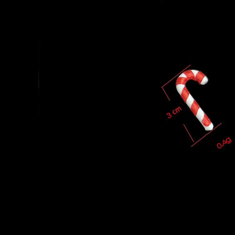 Red and white candy cane-shaped object with measurements on a black background